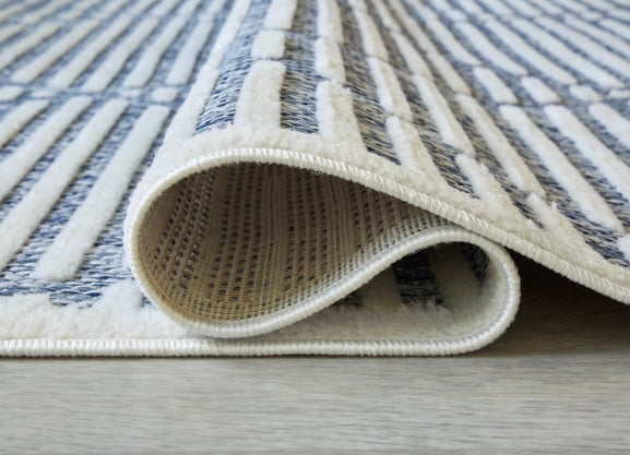 Finnlett Indoor/Outdoor Area Rug - Ashley Furniture